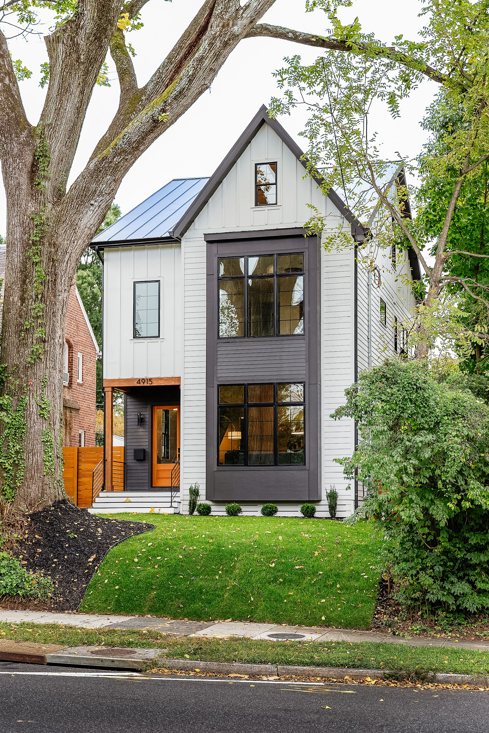 Front facade of modern farmhouse in AU Park